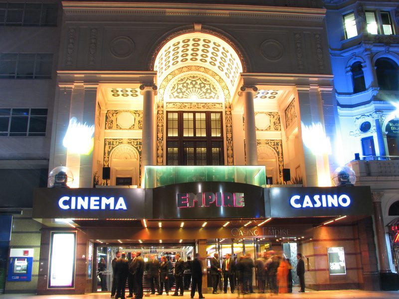 The Empire building on Leicester Square at night with its cinema and casino signs